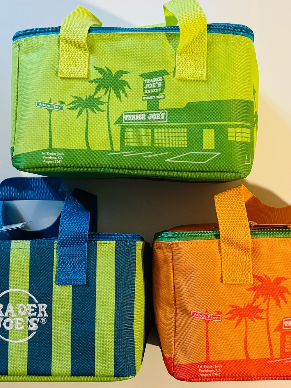 Trader Joe's Summer Fun Cooler Bag. $25 Each. Green, Orange, Blue/Green Stripe.